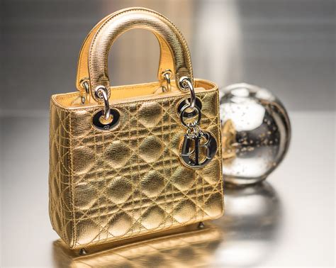 dior gold handle bag|Dior gold handbag.